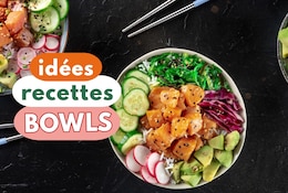 Bowls remplis de légumes frais, saumon et citron.